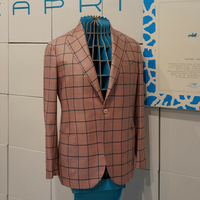 All PiaLauriCapri garments are embellished with the small blue Capri lizard
