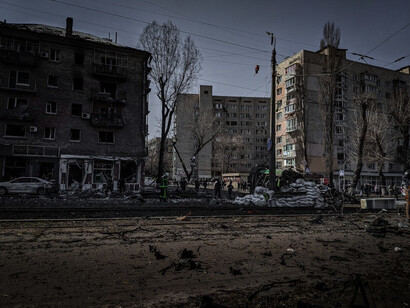 A desolate scene in Kyiv, Ukraine, reveals the aftermath of the war with Russia, where once vibrant streets are now strewn with debris and remnants of shattered lives
