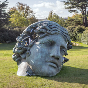 Daniel Arsham, Unearthed bronze eroded Melpomene, 2021. Installation view at Yorkshire Sculpture Park. Courtesy of Yorkshire Sculpture Park, Perrotin Gallery and Arsham Studio. Photo by Anthony Devlin/Getty Images
