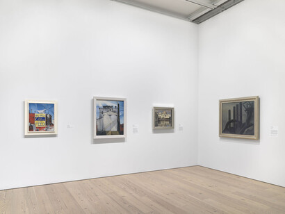 Installation view of The Whitney’s Collection: Selections from 1900 to 1965 (Whitney Museum of American Art, New York, June 28, 2019- ). From left to right: Charles Demuth, Buildings, Lancaster, 1930; Charles Demuth, My Egypt, 1927; Charles Sheeler, River Rouge Plant, 1932; Elsie Driggs, Pittsburgh, 1927. Photograph by Ron Amstutz
