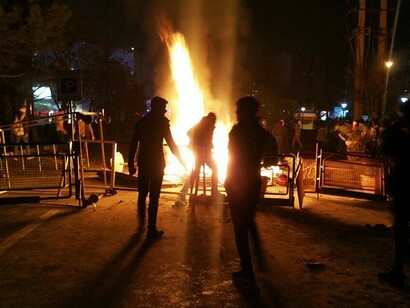 Iranian protester shot dead by Police during the demonstrators protesting high prices and the poor state