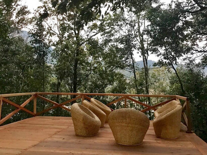 Ethnic cane & wooden verandah at Abor Country