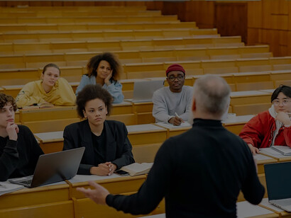 A professor engages and enlightens students within the confines of a lecture hall