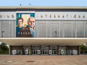 Kino International (Cinema International) at Karl-Marx-Allee 33 in Berlin-Mitte. Built between 1961 and 1963 to a design by architect Josef Kaiser, the building is designated as a historic landmark, Germany