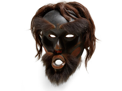 Dzunukwa Mask or Gikamhl (Chief’s Mask), Kwakwaka’wakw (Kwakiutl), British Columbia, ca. 1870. Wood (alder), pigment, human hair and bear hide, 11 x 7 5/8 x 5 3/4 inches without hair. From the Estelle and Morton Sosland Collection, 2009.41.1.