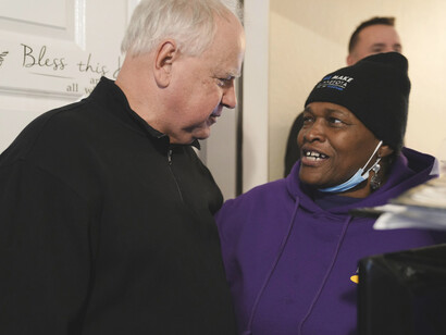 Tim Walz at an event with with Home Care workers