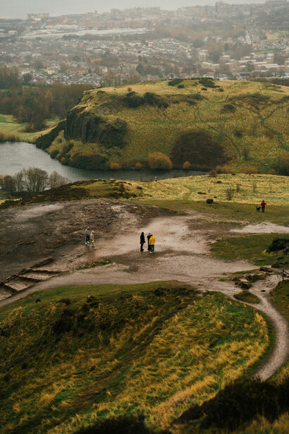 Arthur's Seat is a popular hiking spot with geological significance, offering a mix of nature, history, and stunning vistas from its 251-meter summit