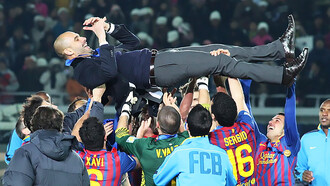 FC Barcelona's 2011 Team of the Year celebrates with Pep Guardiola lifted in the air