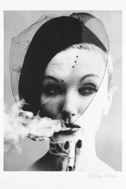 William Klein, Smoke + Veil, Paris (Vogue), 1958. Platinum palladium print, printed later
77 x 56,5 cm. Edition of 20, signed in pencil on print recto, numbered in pencil on print verso Courtesy of Fifty One Too