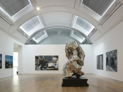 The M+ Sigg Collection – Chinese Art from the 1970s to Now at The Whitworth, Manchester. Background: New Beijing (2001) by Wang Xingwei. Foregroung: Artificial Rock No.31 (2001) by Zhan Wang. Photography by Michael Pollard 2015, Image courtesy of The Whitworth