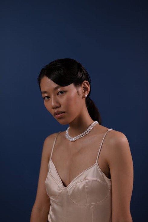 A portrait of poise and contemplation, this look symbolises the transformative impact of third-generation fashion innovation amidst evolving consumer preferences and regulatory landscapes