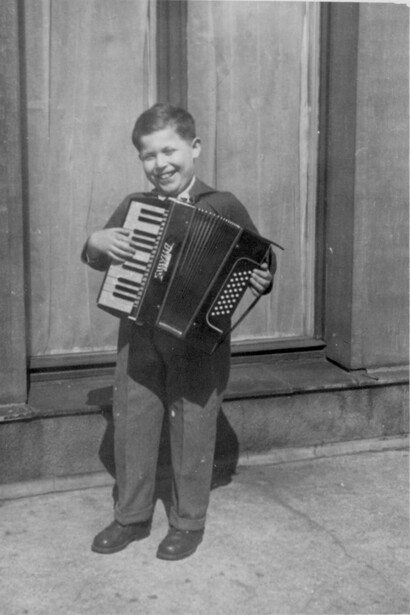 Daniel Libeskind playing his accordion in Lodz, Poland, 1955, aged 9