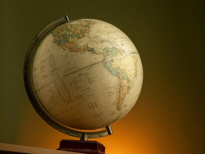 A softly lit globe on display, symbolising the rising pressure to reform international institutions like the United Nations
