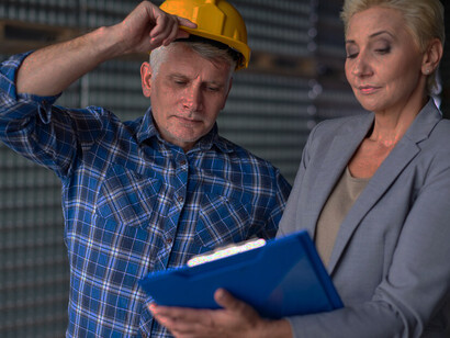 Senior workers in a warehouse, highlighting the increasing presence of older adults in the workforce and their vital role in various industries