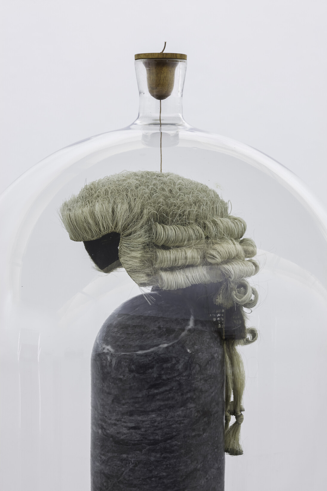 Dorothy Cross, Distil, 2014, barrister’s wig, marble, glass, leather, mahogany, height: 152 cm, diameter: 57.7 cm, height 59.8 in diameter 22.7 in, courtesy of the artist and Kerlin Gallery, Dublin 
