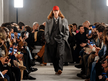 Models showcase the Ami Paris Women’s and Men’s Fall/Winter 2026 collection at Paris Fashion Week