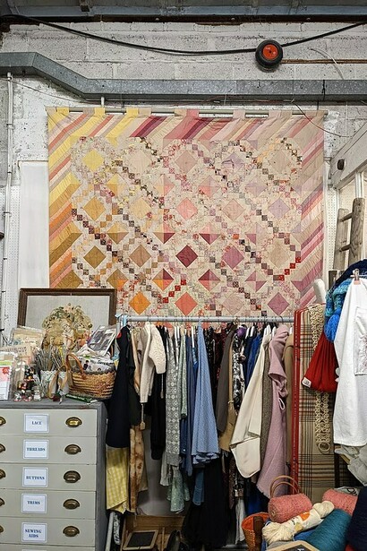 Vintage quilts at antique market in England 