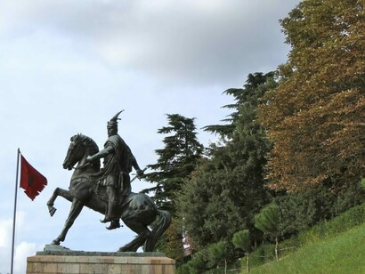 Statue of George Kastrioti Skanderbeg amongst the trees in Tirana, Albania