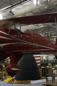 A Bücker Bü 133 Jungmeister replica with a Lycoming IO-540 engine on display at the Frontiers of Flight Museum at Dallas Love Field in Dallas, Texas, United States