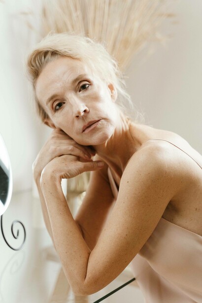 Elderly woman observing