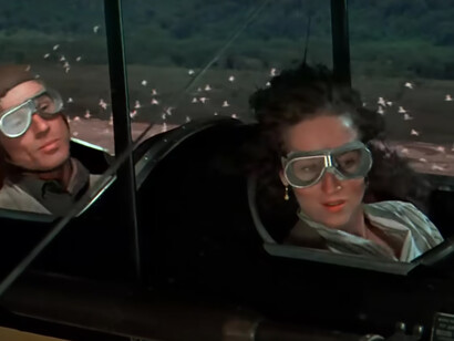 Robert Redford and Meryl Streep captivate audiences as they soar over the picturesque landscapes of Kenya in the cinematic masterpiece 'Out of Africa'