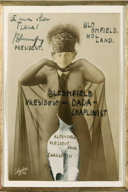 Erwin Blumenfeld. Bloomfield, President-Dada-Chaplinist, 1921. Collage of brown-toned, gelatin-silver photograph cut-outs (Portrait Blumenfeld) on a gelatin-silver photo-postcard of a female nude, with halftone print and ink, 13.4 x 8.8 cm. Kunsthaus Zürich © Estate of Erwin Blumenfeld
