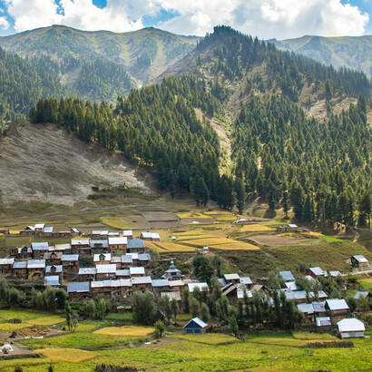 Majestic mountains wrapped in rolling clouds, Gurez Town, Kashmir, India