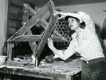 Monir Shahroudy Farmanfarmaian in her studio working on Heptagon Star, Tehran, 1975. Photo: Courtesy of the artist and The Third Line, Dubai