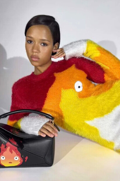 The fire, Calcifer, was once a falling star. The wizard Howl caught him and gave him his heart. Calcifer holds Howl's humanity, powers the castle, and allows Howl to use powerful magic. Photo by © Loewe
