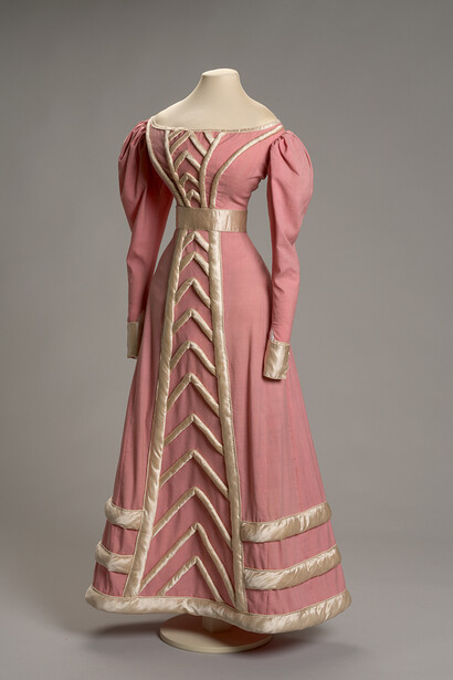 Pink cashmere dress with long leg-of-mutton sleeves trimmed with pink satin rouleaux, 1826. Courtesy of The State Hermitage Museum