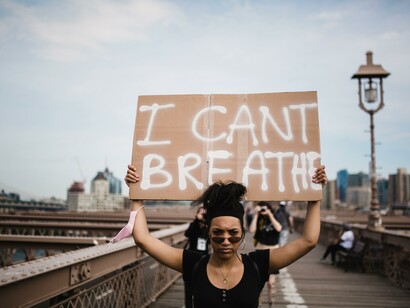 A woman protesting for the Black Lives Matter movement