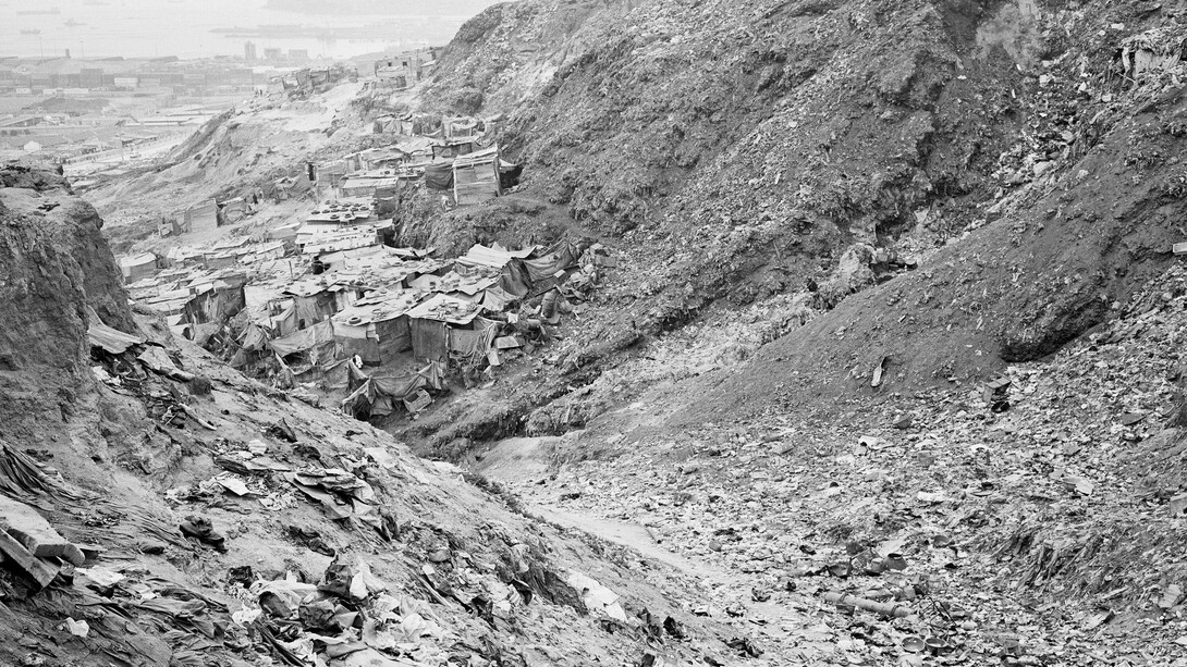 Jo Ractliffe (South African, born 1961)
Woman on the footpath from Boa Vista to Roque Santeiro market, 2007
From the series Terreno Ocupado
Inkjet print, 2015
On loan from the artist, courtesy Stevenson, Cape Town and Johannesburg
© Jo Ractliffe. Courtesy of Stevenson, Cape Town and Johannesburg