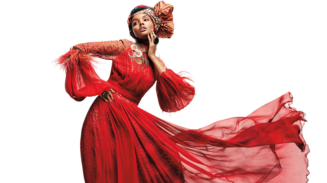Melinda Looi (b. 1973, Malaysia) for Melinda Looi (est. 2000, Malaysia); Ensemble (dress, turban, earrings, rings, and shoes); Sunset in Africa Collection, 2012; Tie-dyed silk chiffon with feathers, semi-precious stones, and Swarovski crystals, silk satin lining; Photograph by Sebastian Kim