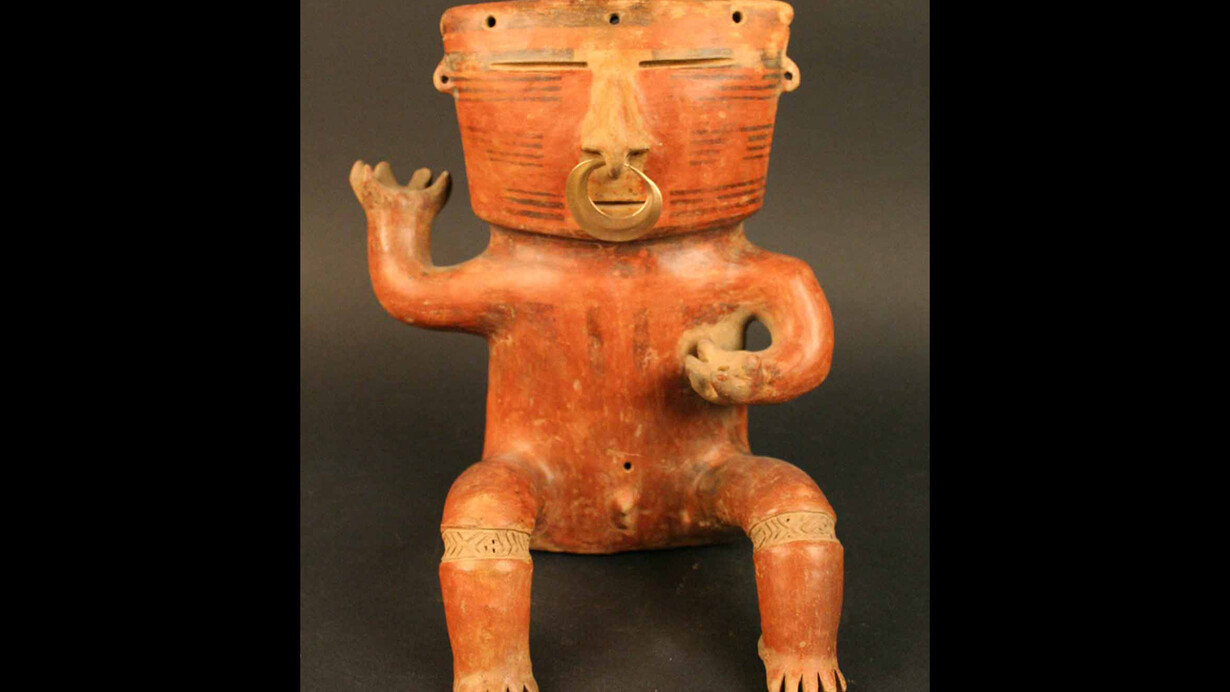 Figura antropomorfa masculina

Materiales: Cerámica

Quimbaya 600- 1500 d.C.

Medidas: 250 mm de alto x 200 mm de ancho
