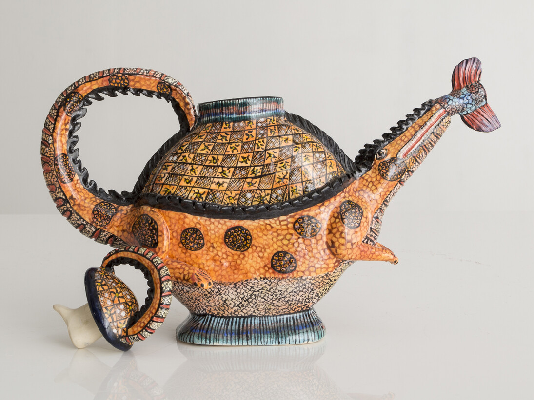 Ardmore, Crocodile Tea Pot. Designed and made by Ardmore, South Africa, 2013. 12.2" L x 2.76" W x 9.06" H / 31cm L x 7cm W x 23cm H. Photo by Joe Kramm/R & Company.