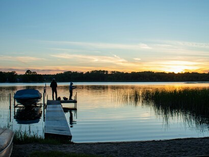 Outdoor adventures in Minnesota range from fishing to boating to simple lakeside reflection