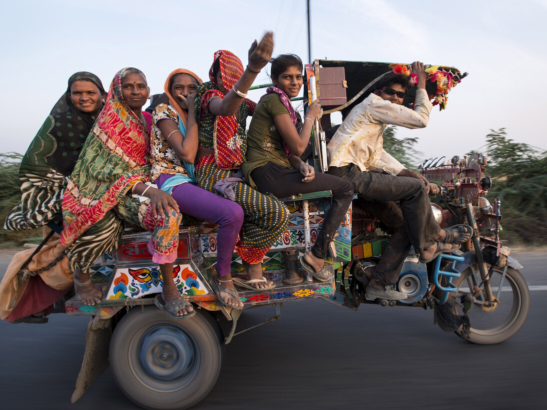India's Gateway - Agricultural workers on bike © Tim Smith