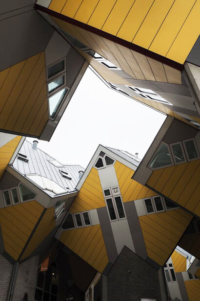 Designed by Dutch architect Piet Blom (1934–1999), the Cube House—also referred to as the Pole House or Tree House—is a striking example of innovative urban architecture