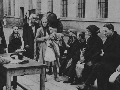Recording names by the German police in the German Nazi camp in Łódź during World War II