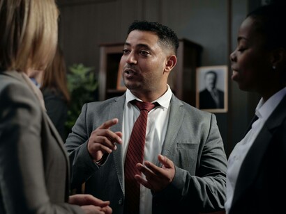 Business man meets government employees to discuss opportunities 