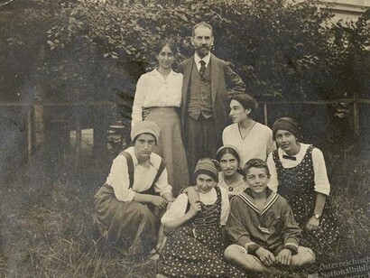 A family picture of the Anders with soon-to-be philosopher Günther sitting up front on the grass in Wroclaw, Poland in 1911