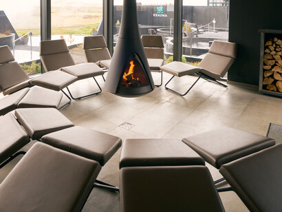 The layout is organic compared to the building’s geometric forms, the soft shapes reflecting the natural flow of the water