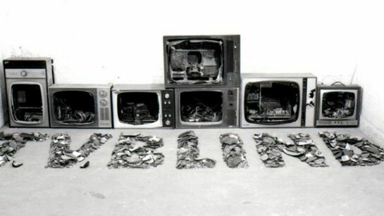 Bill Woodrow RA, T.V. Blind, 1979, 7 Televisions, 89 x 160 x 352 cm, Collection of the artist