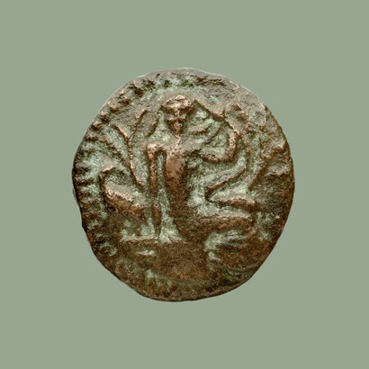 Moneta in bronzo ritrovata durante gli scavi archeologici nell'antico sito di Gortina, Creta, Grecia. Attualmente conservata presso la Bibliothèque nationale de France, Francia