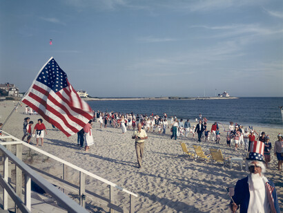 Tina Barney, 4th of July on Beach, 1989, chromogenic color print, 30 x 40 inches, 76.2 x 101.6 cm. Edition of 5 (#1/5)© Tina Barney. Courtesy Paul Kasmin Gallery