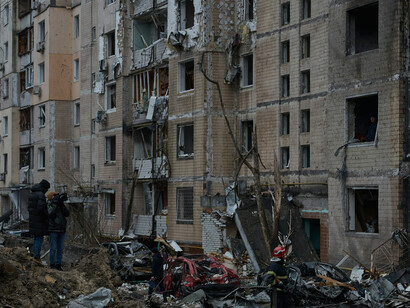 On January 2, 2024, Kyiv, Ukraine: A Russian missile attack has destroyed a residential building. Rescuers and firefighters are on-site, providing aid to affected civilians and working to put out the fire