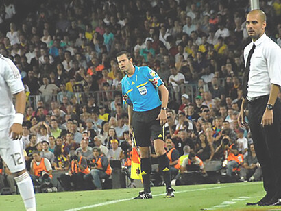 FC Barcelona faces off against Real Madrid CF in the August 17, 2011 Spanish Super Cup match, ending in a 3-2 victory, with Pep Guardiola coaching