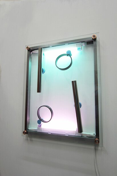 Two Poles Two Holes, Mark Davey, 2015, Glass, lights, steel, 45 cm x 57 cm. Courtesy of the artist and The RYDER Projects, London
