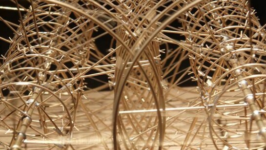 Kristoffer Myskja, Machine that uses a thousand years to shut itself down 2006 brass, drive belts, motor, steel, solar panels, MDF base, 37,5 x 24,5 x 25 cm