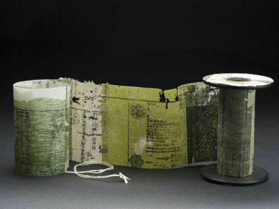 Yuko Kimura, Moss Spool Book no.3, 2012, etching on antique book pages from Japan, linen thread, wooden spool, 4 1/4 x 3 x 43 inches